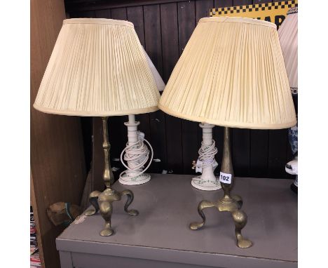 PAIR OF BRASS TRIPOD TABLE LAMPS AND A PAIR OF CANDLESTICK TABLE LAMPS 