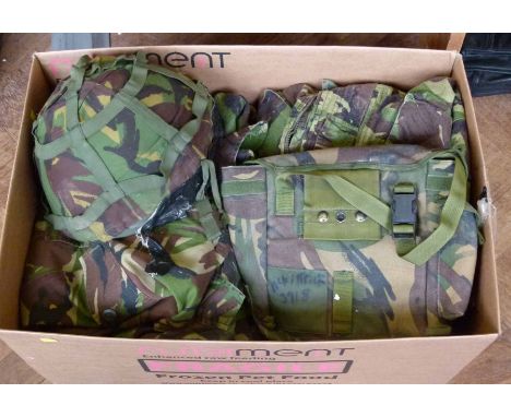 Collection of British Army uniforms including jackets, 1 helmet, 1 gas mask, bag etc. Condition report: see terms and conditi