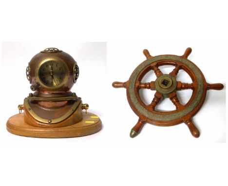 Brass and hardwood ships wheel and mantel clock in form of a divers helmet. Condition report: see terms and conditions