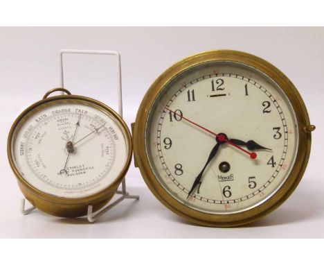 Circular brass aneroid barometer by Stanley (Great Turnstile, Holborn) and brass cased Mercer 9St Albans) wall clock Conditio