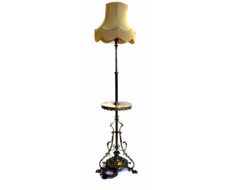 Art nouveau brass standard oil lamp converted to electricity, the fixed telescopic stem over a circular green marble tier, on