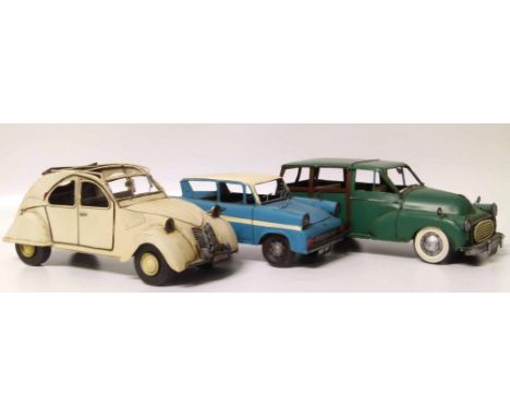 3 modern tin plate motor cars approx 37cm long, viz. Citroen 2 CV, Ford Angia and Morris 1000 estate car Condition report: se