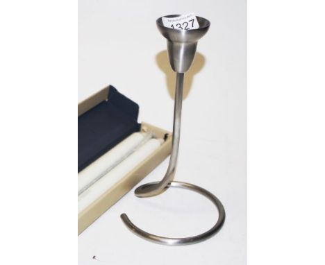 Georg Jensen stainless silver candlestick height 23cm approx, together with a box of two Georg Jensen candles