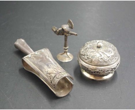 Two silver Oriental decorative pieces including: a stone set bouquet holder; and a small bird on a branch figure, together wi