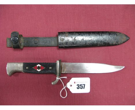 A German Hitler Youth Dagger, in original scabbard, blade altered.