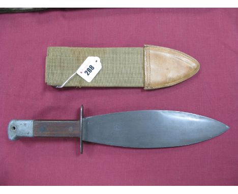 A Reproduction U.S. Smatchet Fighting Knife, as used by S.A.S and O.S.S, in its canvas and leather scabbard.