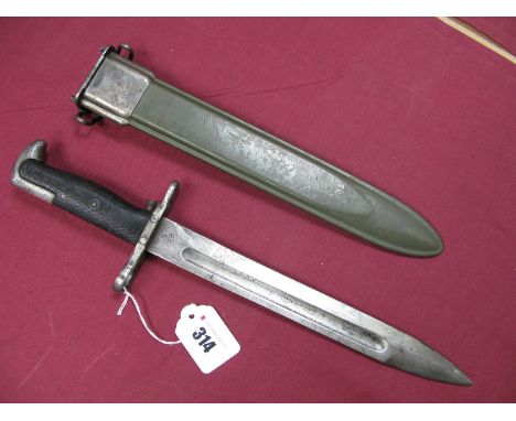A Mid XX Century U.S. Model  M1 Bayonet for the Garand Rifle the 9¾" blade marked  "PAL" and U.S. with two piece black plasti