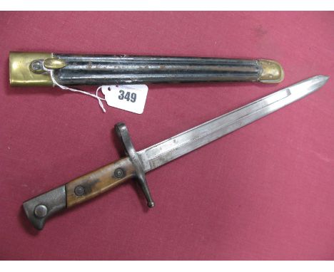 A Late XIX Century Italian Carcano/Bayonet Model 1891, blade 115/8" long, minor rusting in its black leather scabbard with br