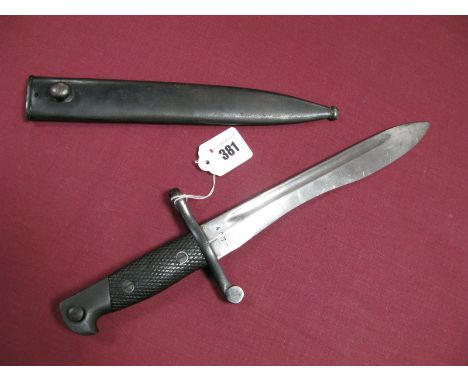 A Mid XX Century Spanish "Bolo" Bayonet, blade engraved "FN Toledo" two piece wooden grips cross guard loose, in its correct 
