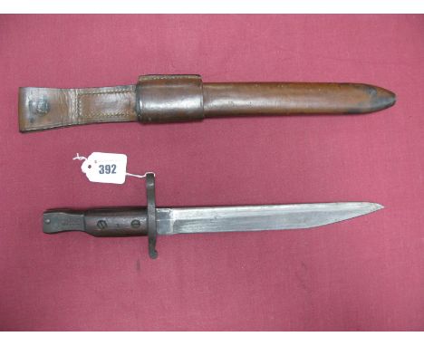 WWI Canadian Ross Bayonet For The Ross Rifle, pattern 1905 with a 10 1/8" blade, no fulers, wooden grips, hilts stamped "Ross