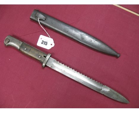 A Late XIX Century German Model 1884/98 with 9½" Sawback Blade, made by "Bontgen &amp; Sabin Solingen", damage to blade noted