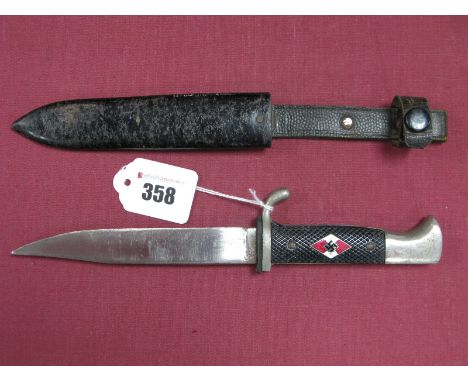 A German Hitler Youth Dagger, in original scabbard, blade altered.