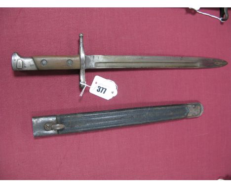 A Late XIX Italian 1891 Pattern Bayonet ,11¾" blade, cross guard marked "Rocca" "1942", in its black leather scabbard with me