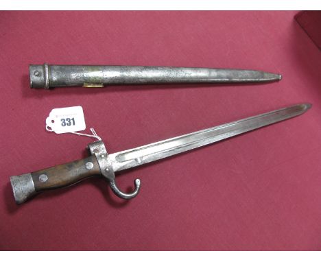 A Late XIX Century French 1892 Model Bayonet, with 15¾" blade Arsenal marked  and in its steel scabbard, average condition.