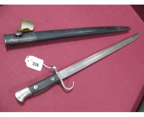 WWI British 1907 Pattern Bayonet With Rare Quilion, all metal parts plated showing signs of wear, in its black leather scabba