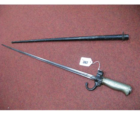 A Late XIX Century French 1886 Model Bayonet, with long cruciform blade 20½" long, the hilt is white metal and cross guard pa