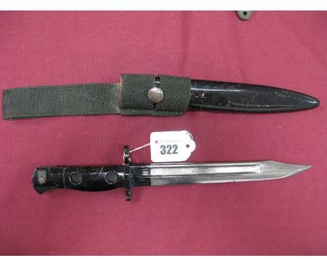 A Mid XX Century British L1A1 Bayonet for the S.L.R. the hilt stamped "L1A3" and "9600257" with 8" clipped point blade, in it
