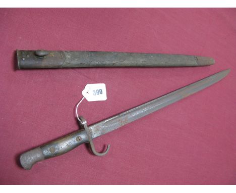 An Early XX Century 1907 British Bayonet with Rare Quillion, heavily rusted and pitted blade and metal work, in its leather s