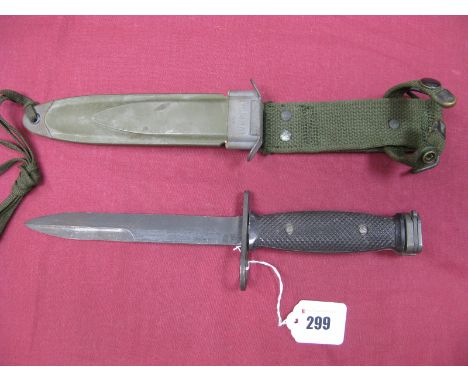 A Late XX Century American M7 Model Bayonet, with 6¾" blade, cross guard marked "U.S.M7" and makers initials , two piece blac