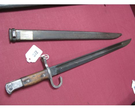 A Late XIX Century Japanese Arisaka Bayonet, model of 1897 the 15½" blade arsenal marked. The hilt with plain wood grips and 