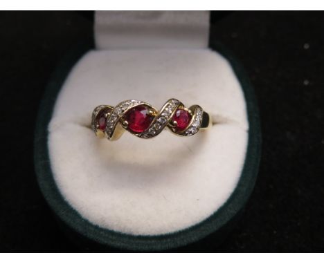 9ct Gold ring set with rubies &amp; diamonds