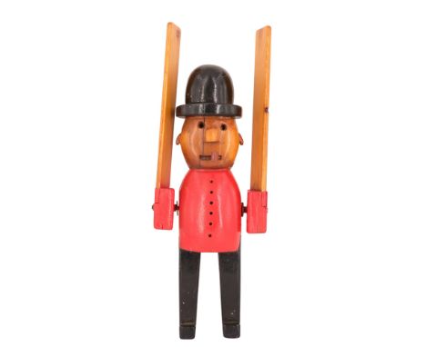 A carved and painted figural wind vane, of recent manufacture, 39 cm