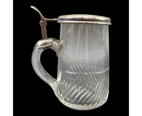 A late 19th / early 20th Century German 0.5 l beer stein, in facet-cut free-blown glass with engine-turned electroplate mount