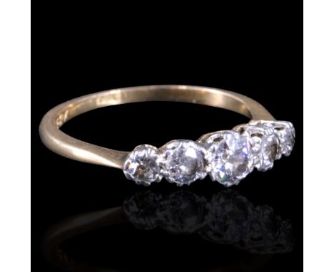 A five-stone diamond dress ring comprising graded round-cut stones of approx 0.4 ct aggregate weight claw-set on precious whi