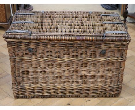 A vintage wicker laundry or similar basket, 85 cm x 50 cm x 50 cm