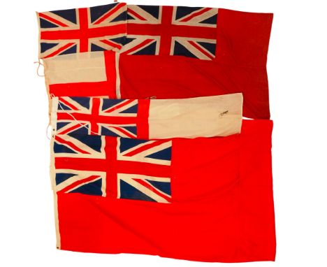 Two cotton Red Ensign flags, a White Ensign (Ordnance stamped), a Union Flag and a flag of Saint George, largest 110 cm x 240