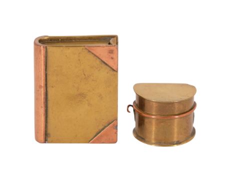 A Great War “trench art” petrol lighter in the form of army mess tins together with a similar example in the form of a book, 