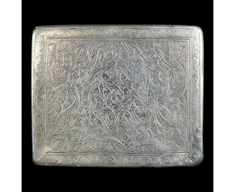 A 1940s Egyptian white metal cigarette case, profusely arabesque engraved overall, Cairo, 1943-4, 97.5 cm x 9 cm