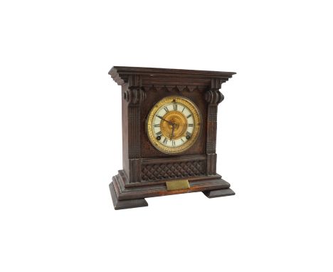 An early 20th Century Ansonia "Salem Strike" shelf clock bearing an engraved presentation plaque to "Sister A R Blair, by the