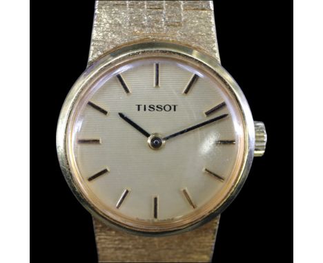 A vintage lady's Tissot gold plated dress wristwatch, having a calibre 2700 manual-wind movement and champagne face with gilt