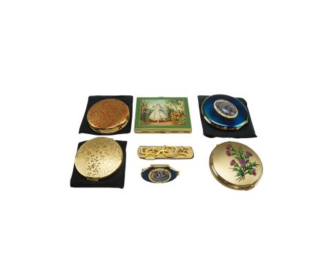 A 1960s Kigu blue rose pattern powder compact with matching combined lipstick holder and mirror, together with Stratton and o