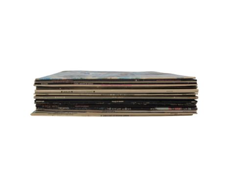 A group of vintage LP records including works by The Beatles, John Lennon, Joan Armatrading, The Who and Elton John