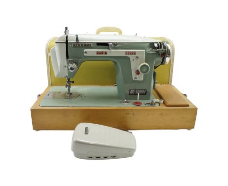 A vintage New Home green Model 532 sewing machine, circa 1960s