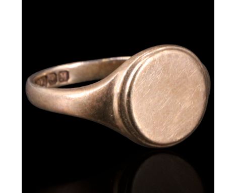 A 1930s 9 ct gold signet ring, having a vacant circular face, K/L, 2.6 g