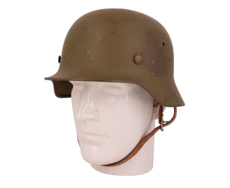 A German Third Reich M34 steel helmet, ET64, refurbished and re-issued post-War by the Norwegian Army, (Norwegian decals appa