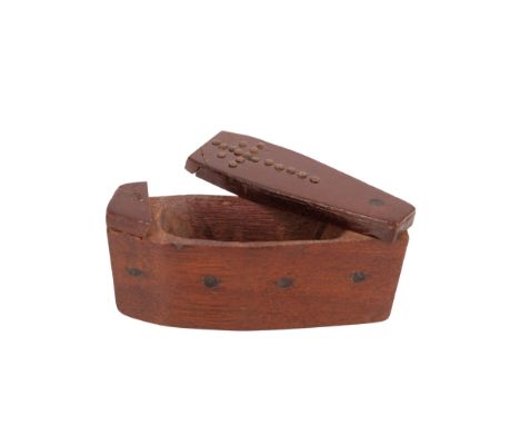 A Victorian macabre mahogany pocket snuff box in the form of a coffin, its lid decorated with brass studs in the form of a cr