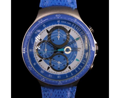 A United Colors of Benetton limited edition Titanium wristwatch, in tinplate box with instructions