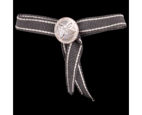 An Imperial German Fliegertruppen Iron Cross commemorative button badge