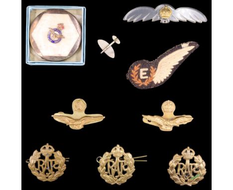 RAF officer's and other ranks' cap badges, an Air Engineer's pin-backed brevet, a Lucite sweetheart brooch, a Spitfire Day pi