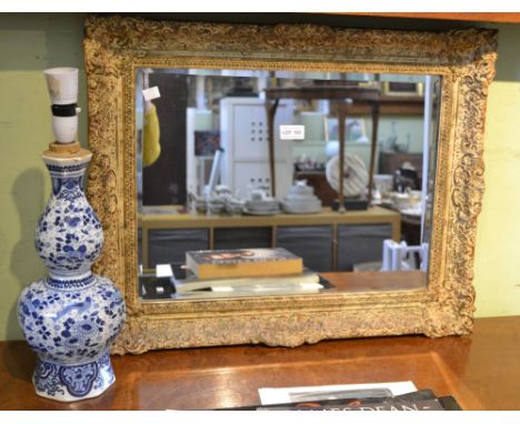 Delft pottery vase (lamp base) and a wall mirror