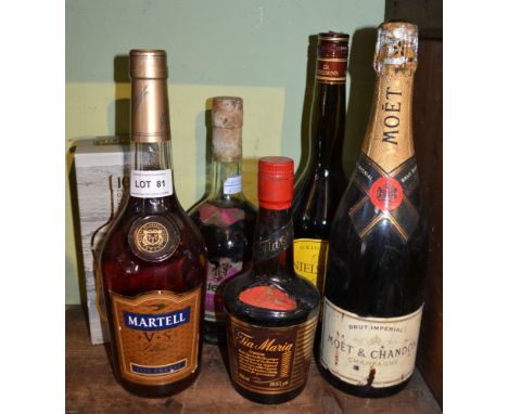 Martell VS Fine Cognac, 1 bottle Moet & Chandon Champagne, 1 bottle Jura 10 year old Single Malt Whisky (boxed), 1 bottle Nie