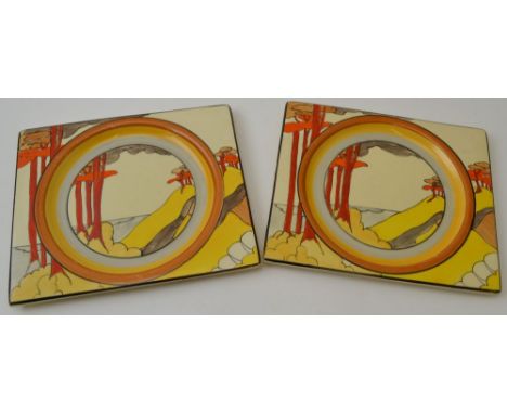 A pair of Clarice Cliff Coral Firs pattern, rectangular Biarritz shape, hand painted pottery plates, each bears printed facto