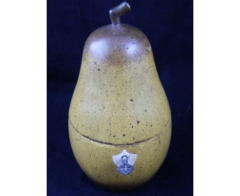 A pear shaped tea caddy, with original key. H. 19cm