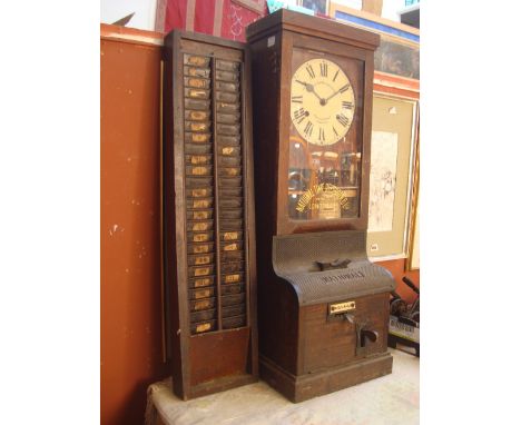 An early 20th Century National Time Recorder clocking in machine.  Inscribed 'National Time Recorder Co. Ltd, London SE1.  Aq