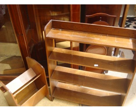A bookcase and a book trough. 