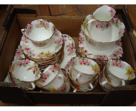 A Royal Doulton twelve setting tea service, HD 3906 Orchid pattern. 